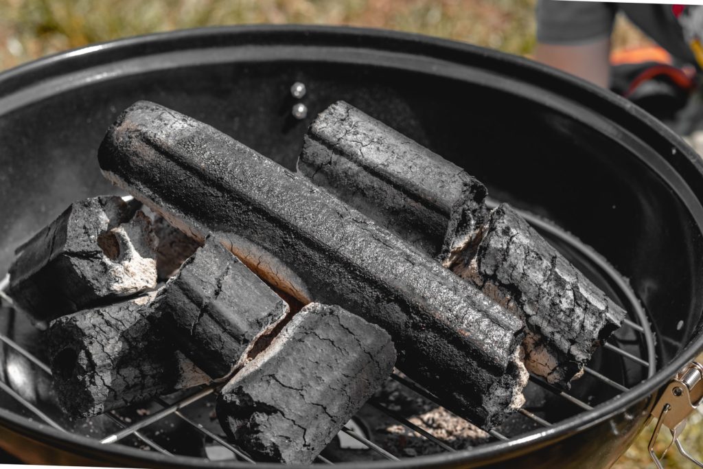 Kettle grill with burning charcoal—why does Holly-tone smell so bad?