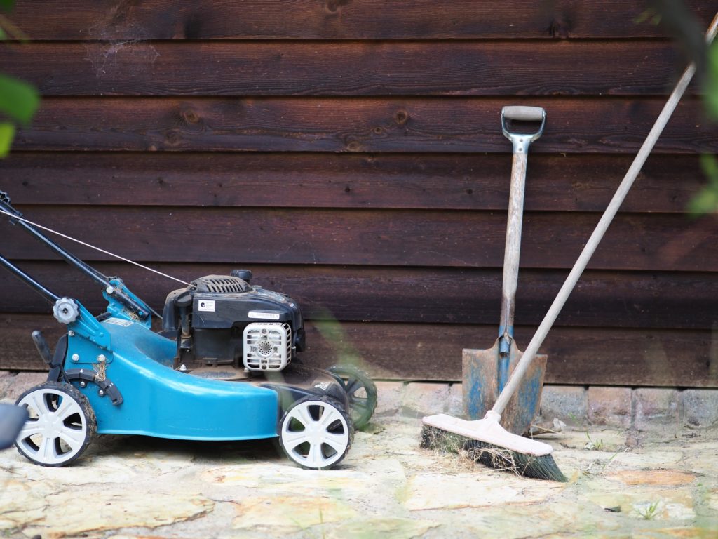 Lawn mower in front of a wooden wall—how to keep mice out of lawn mowers?