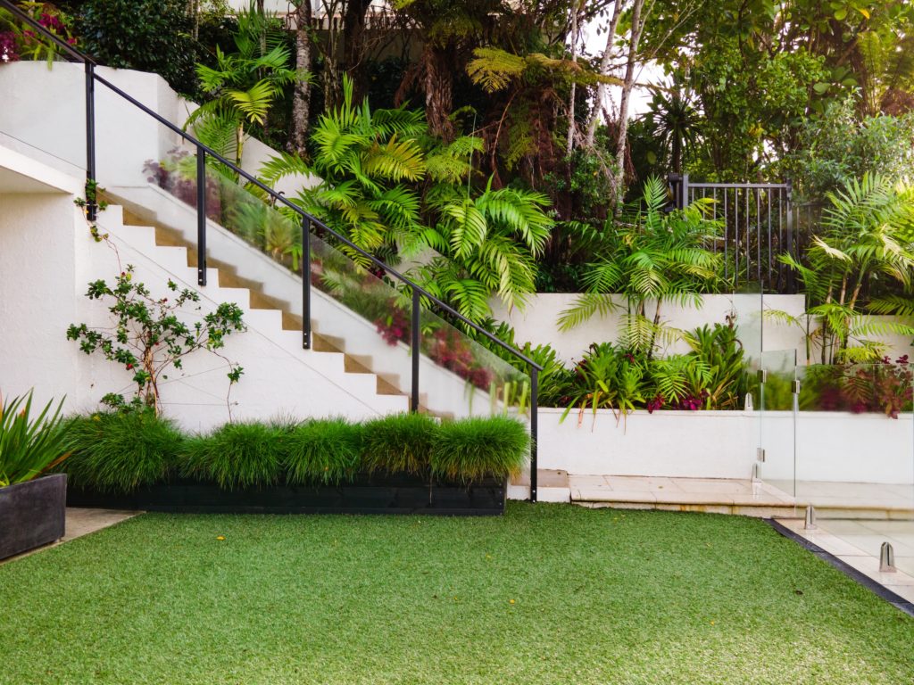 Artificial grass installed in a house—things to consider before buying artificial grass.