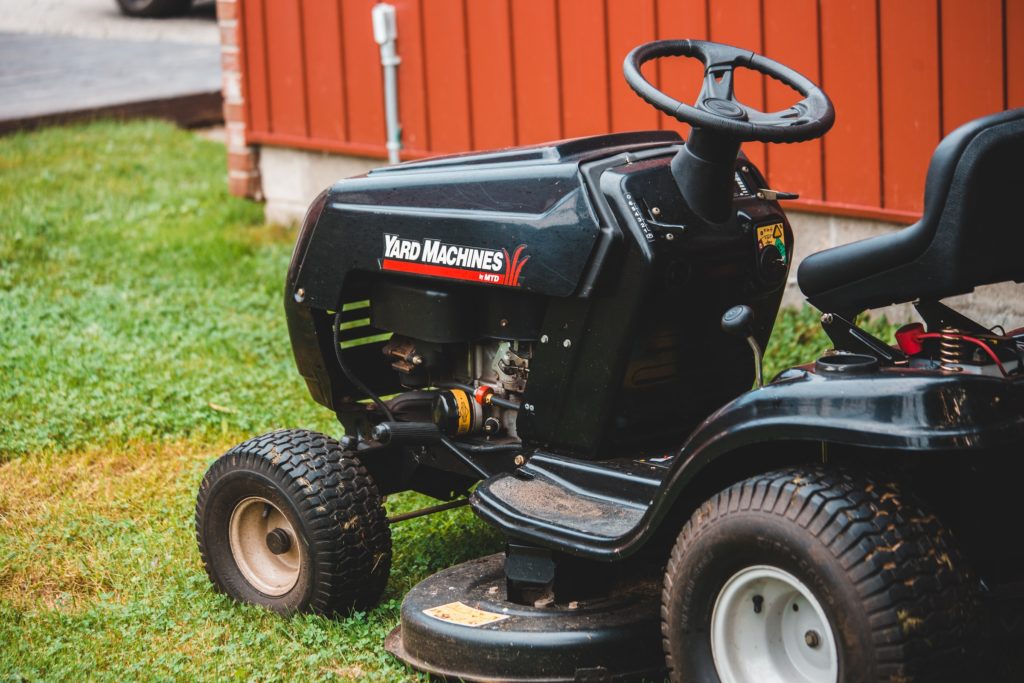 Black lawn mower—best zero turn mower tires for hills.