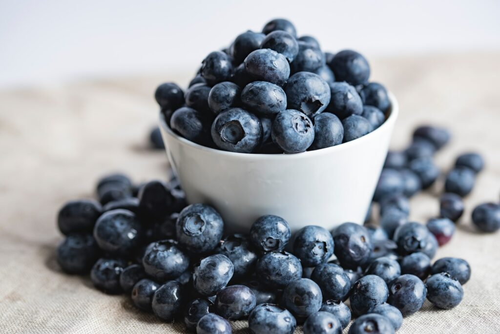 Blueberries in a white cup—why are blueberries so expensive?