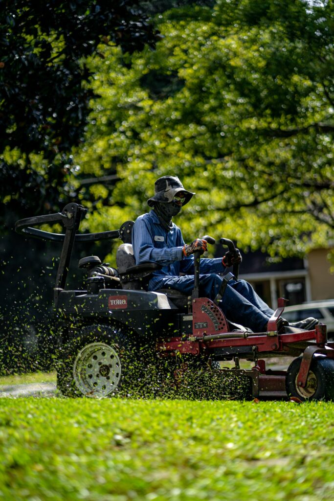 A person riding on lawn mower—why won’t my zero turn mower move?